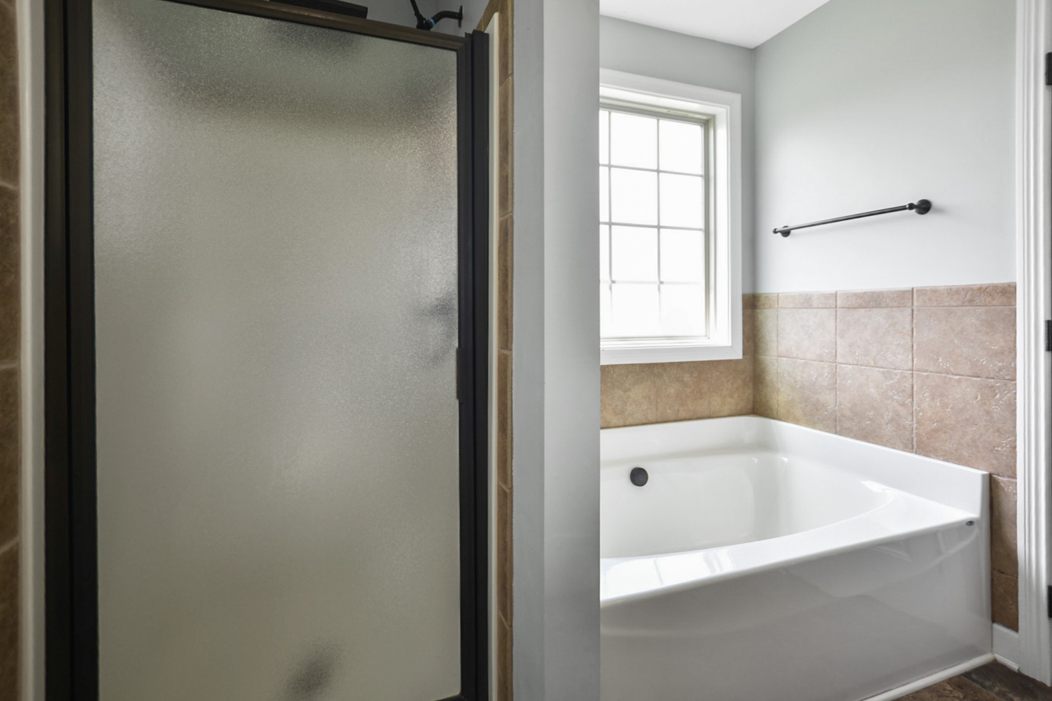 3710 Suiter Road Clarksville, TN 37040 - Photo 11 of 18 a white bath tub sitting next to a window