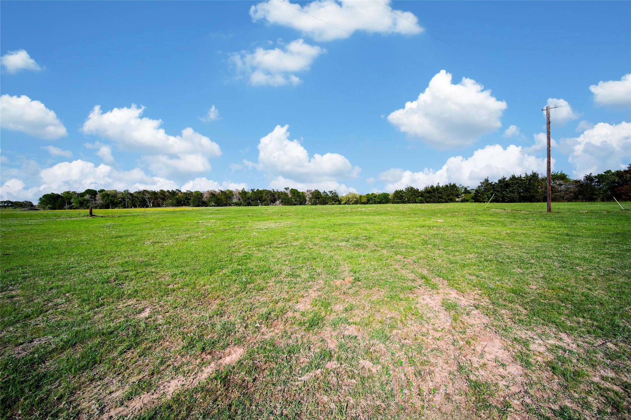 Tbd Old Burton Road Brenham, TX 77833 - Photo 3 of 13 a view of a big yard with an outdoor space and seating
