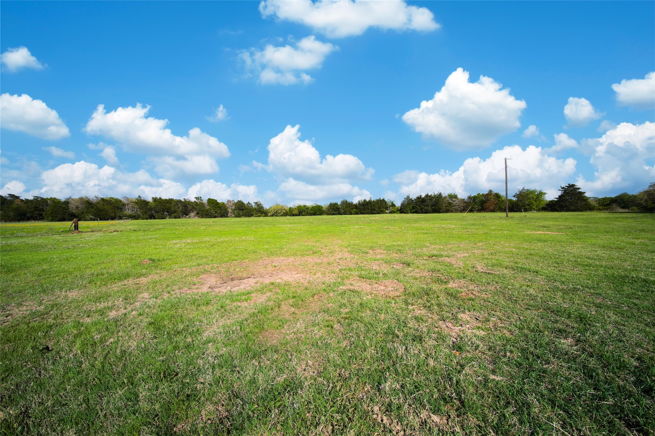 Tbd Old Burton Road Brenham, TX 77833 - Photo 4 of 13 a view of a lake with houses in the back