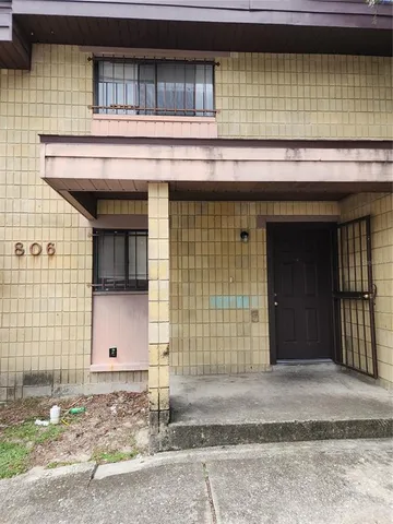 a front view of a house with a garage