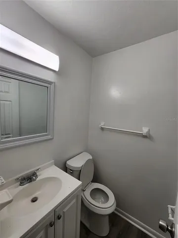 a bathroom with a sink and a toilet
