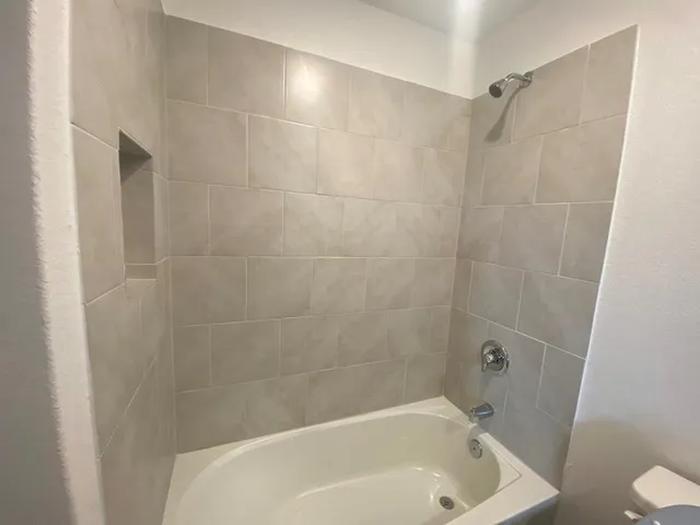 a bathroom with a bathtub