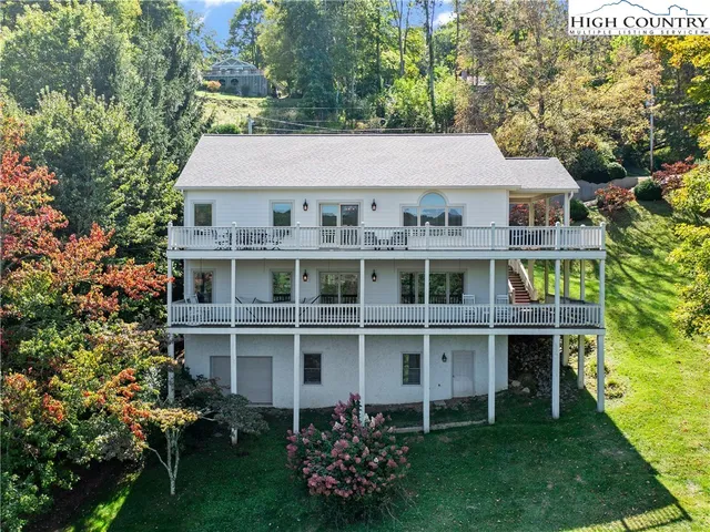 a aerial view of a house with a garden and plants