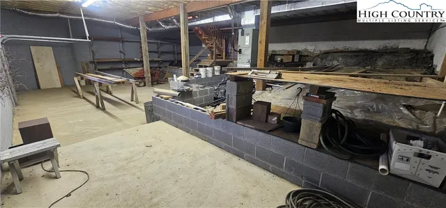 a kitchen with stainless steel appliances granite countertop a stove and a sink