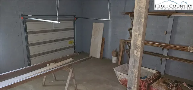 a room with walk in closet and stairs