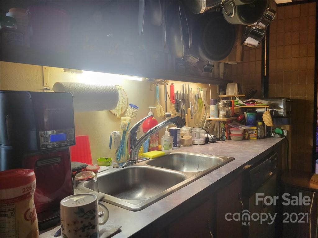7133 Lingerfelt Road Vale, NC 28168 - Photo 6 of 23 a kitchen with a sink and wooden floor