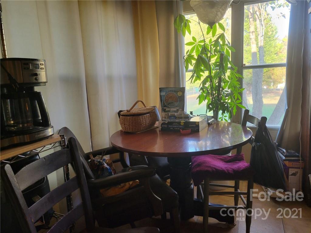 7133 Lingerfelt Road Vale, NC 28168 - Photo 7 of 23 a view of a dining room with furniture and a window