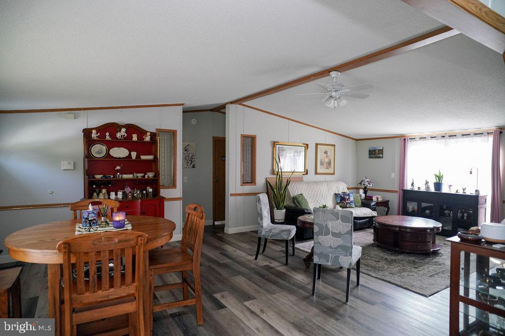 428 Pollack Drive Perryman, MD 21130 - Photo 3 of 13 a living room with furniture a rug and a table