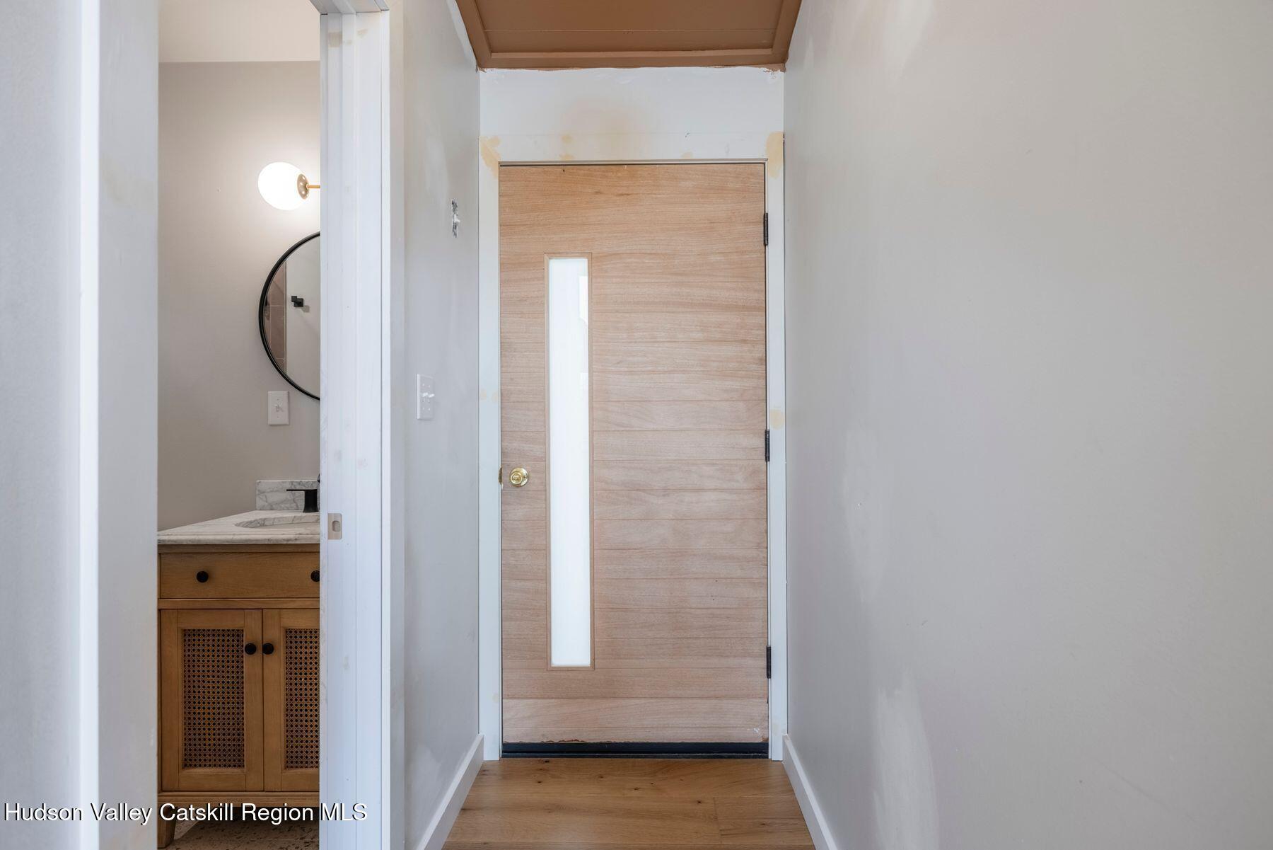 134 Irish Cape Road Napanoch, NY 12458 - Photo 12 of 47 a view of a bathroom from a corridor