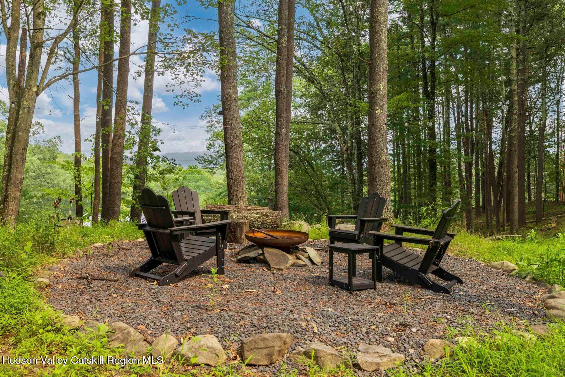 134 Irish Cape Road Napanoch, NY 12458 - Photo 28 of 47 a view of a sitting area with furniture and wooden floor