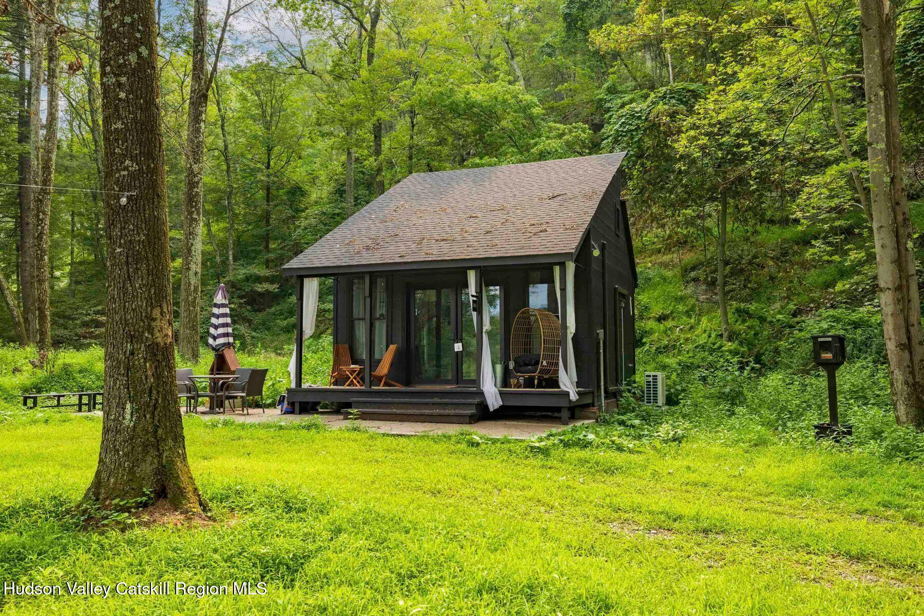 134 Irish Cape Road Napanoch, NY 12458 - Photo 30 of 47 a view of a house with garden