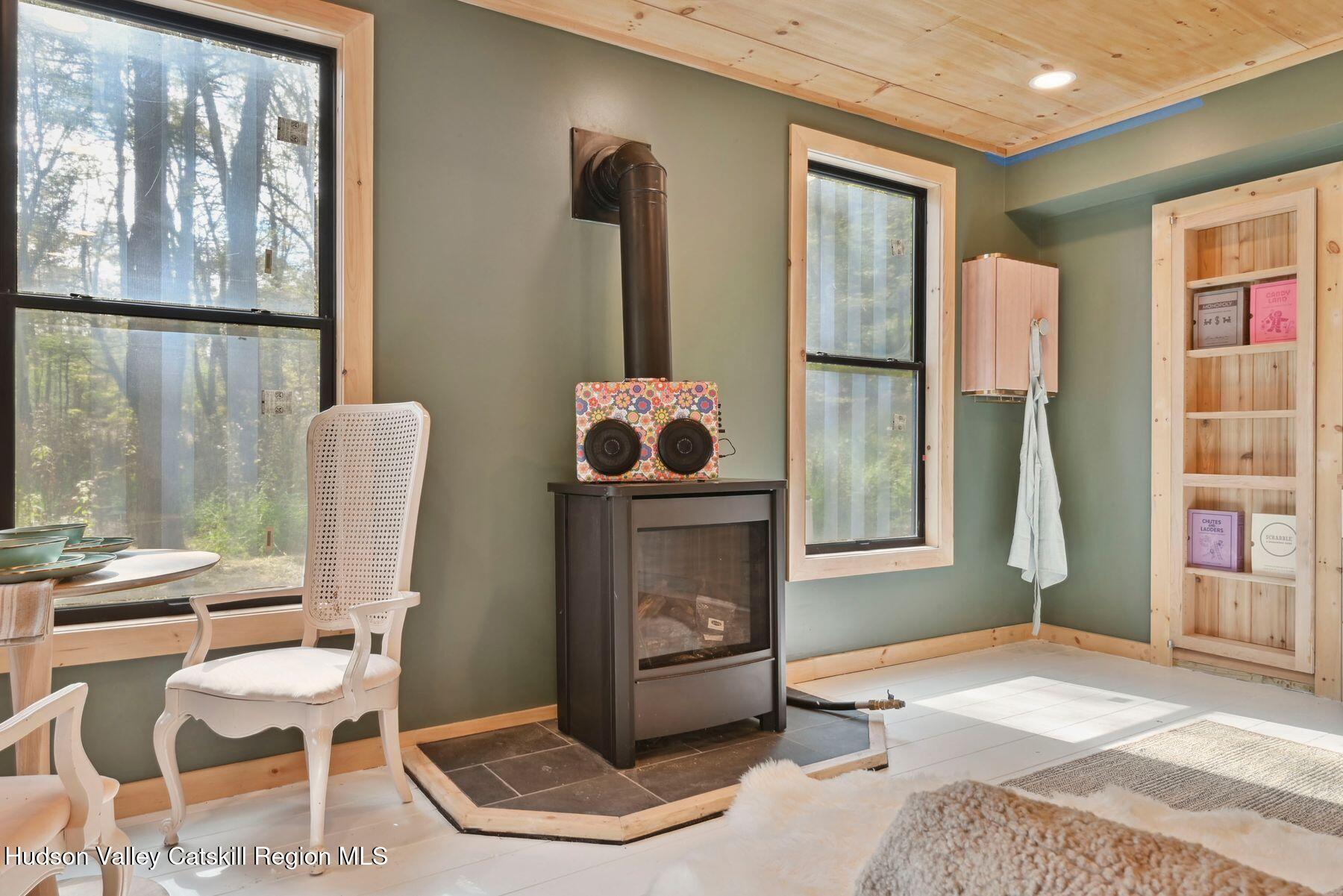 134 Irish Cape Road Napanoch, NY 12458 - Photo 41 of 47 a bedroom with furniture and a window