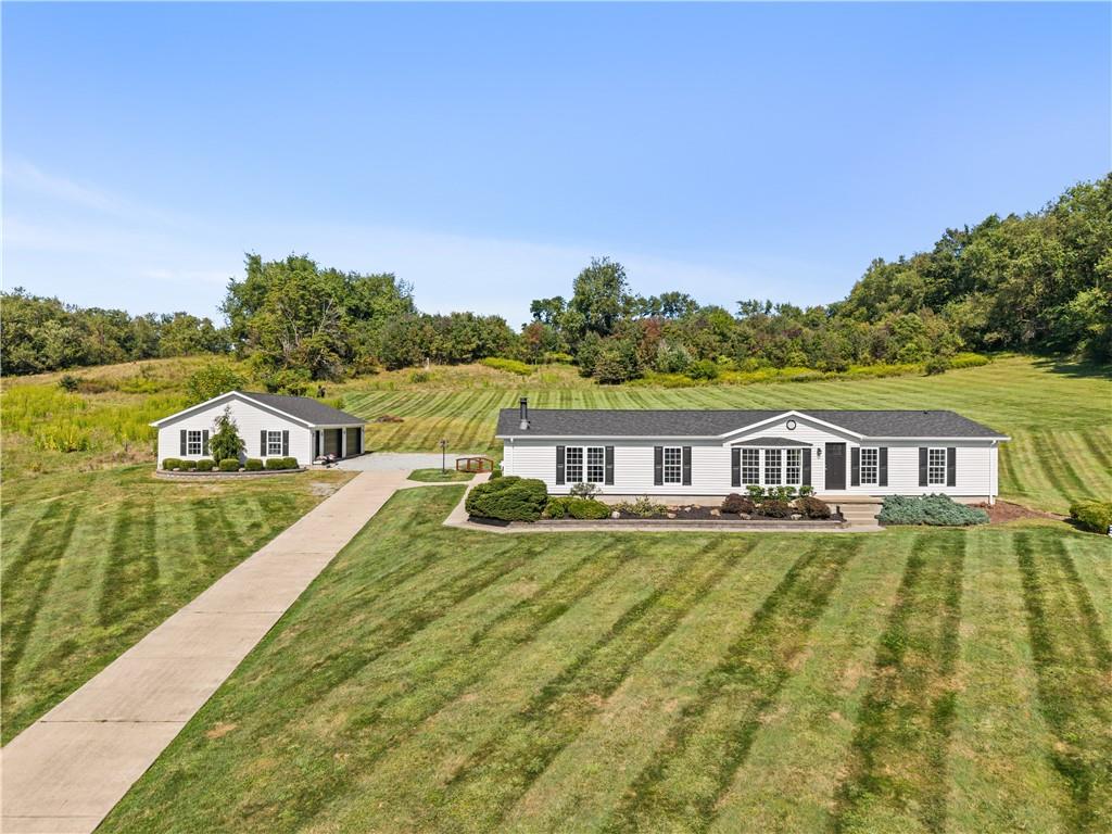 2118 Spooky Hollow Road Lower Burrell, PA 15068 - Photo 1 of 44 a view of a house with a yard and lake view