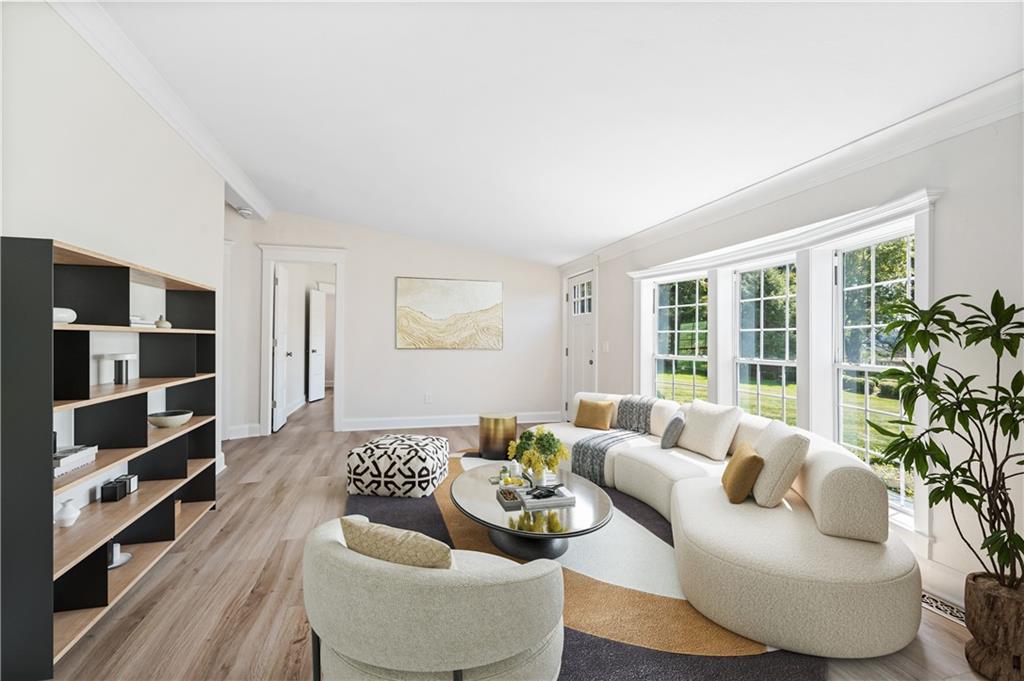 2118 Spooky Hollow Road Lower Burrell, PA 15068 - Photo 14 of 44 a living room with furniture and a large window