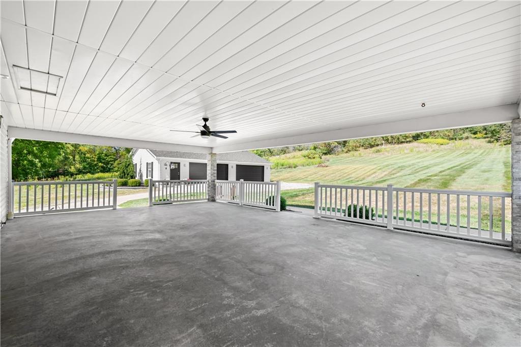 2118 Spooky Hollow Road Lower Burrell, PA 15068 - Photo 30 of 44 a view of a porch with a garden