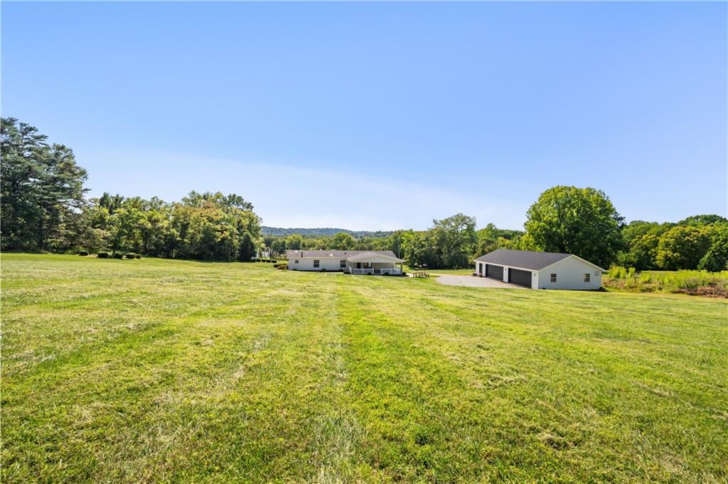 2118 Spooky Hollow Road Lower Burrell, PA 15068 - Photo 34 of 44 a view of a big yard with large trees