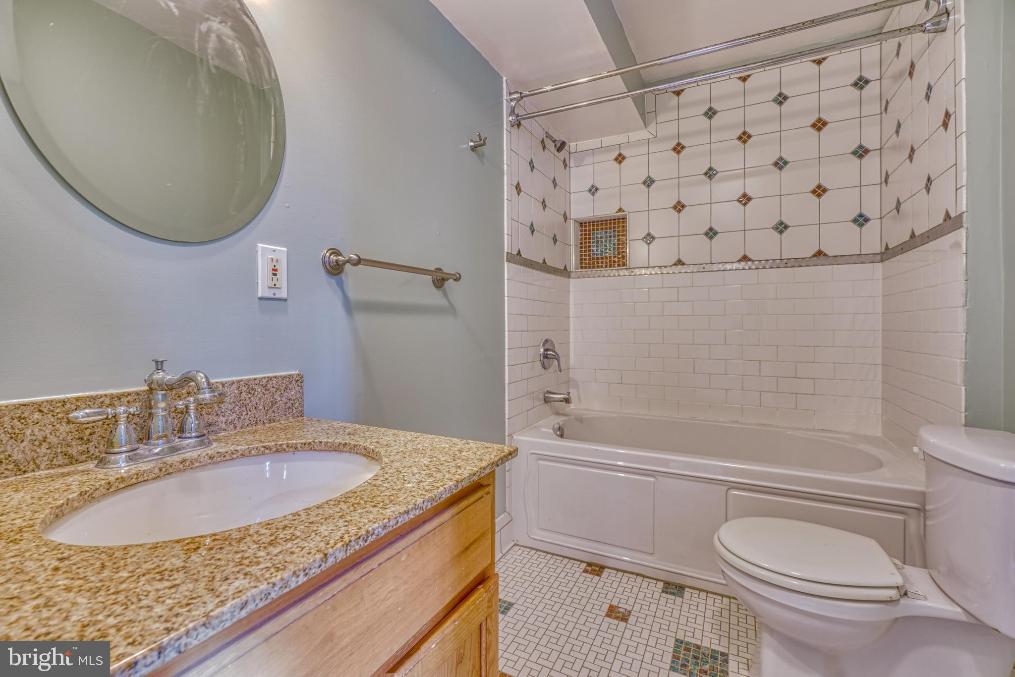 644 Jasper Street Baltimore, MD 21201 - Photo 17 of 27 a bathroom with a sink toilet and shower