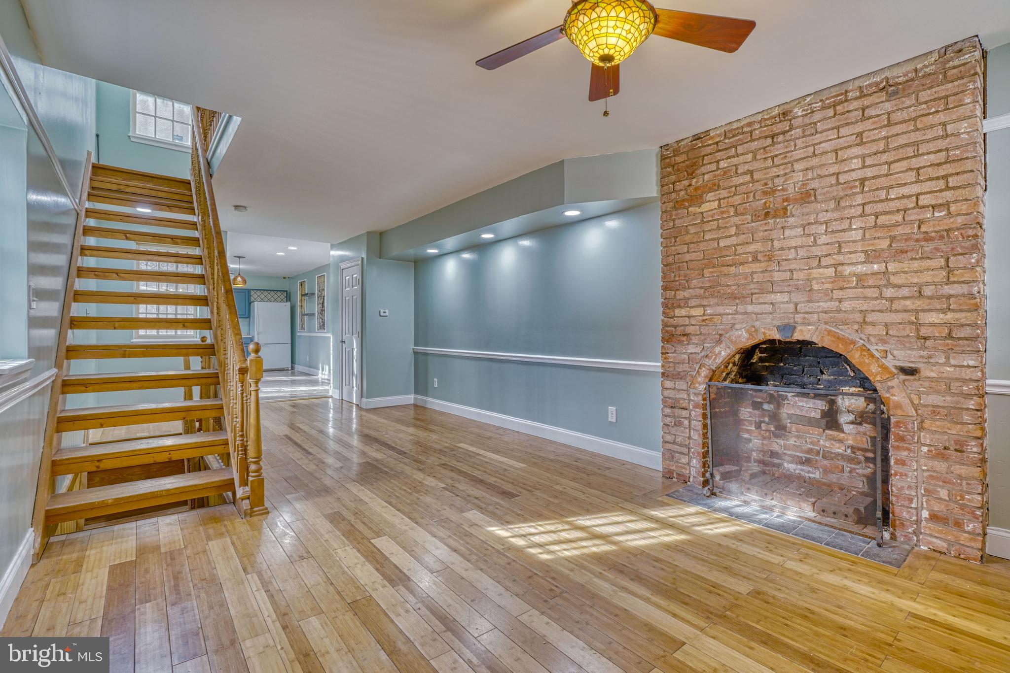 644 Jasper Street Baltimore, MD 21201 - Photo 4 of 27 a view of empty room with a ceiling fan