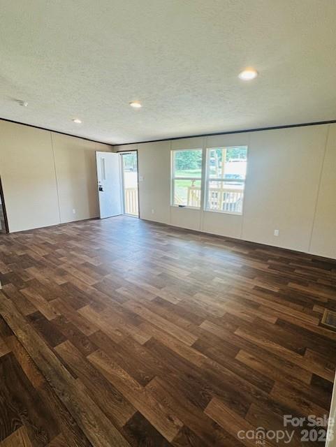 3567 Ken McEntire Road Shelby, NC 28150 - Photo 11 of 20 an empty room with wooden floor and windows
