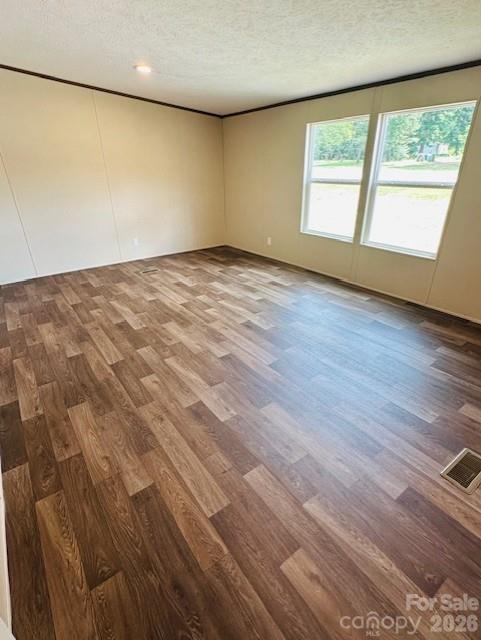 3567 Ken McEntire Road Shelby, NC 28150 - Photo 16 of 20 an empty room with wooden floor and windows