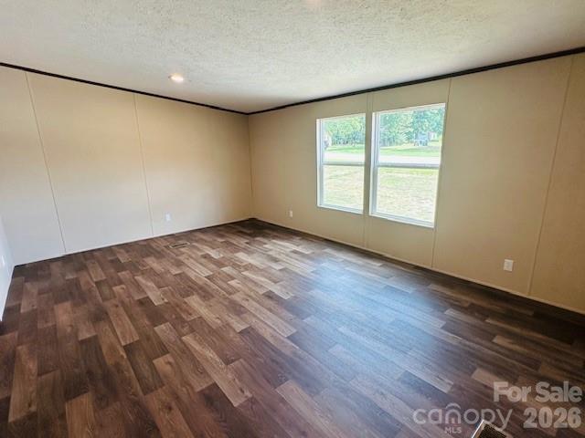 3567 Ken McEntire Road Shelby, NC 28150 - Photo 17 of 20 an empty room with wooden floor and windows
