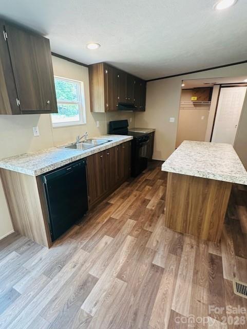 3567 Ken McEntire Road Shelby, NC 28150 - Photo 7 of 20 a kitchen with wooden floors and wooden cabinets
