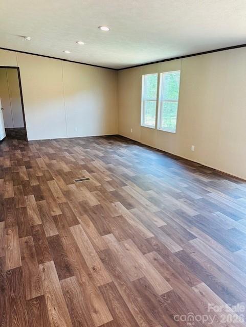 3567 Ken McEntire Road Shelby, NC 28150 - Photo 9 of 20 an empty room with wooden floor and windows