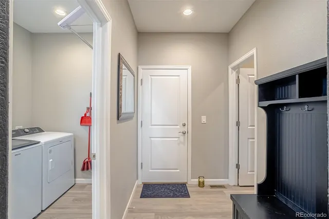 a view of an empty room with a sliding door