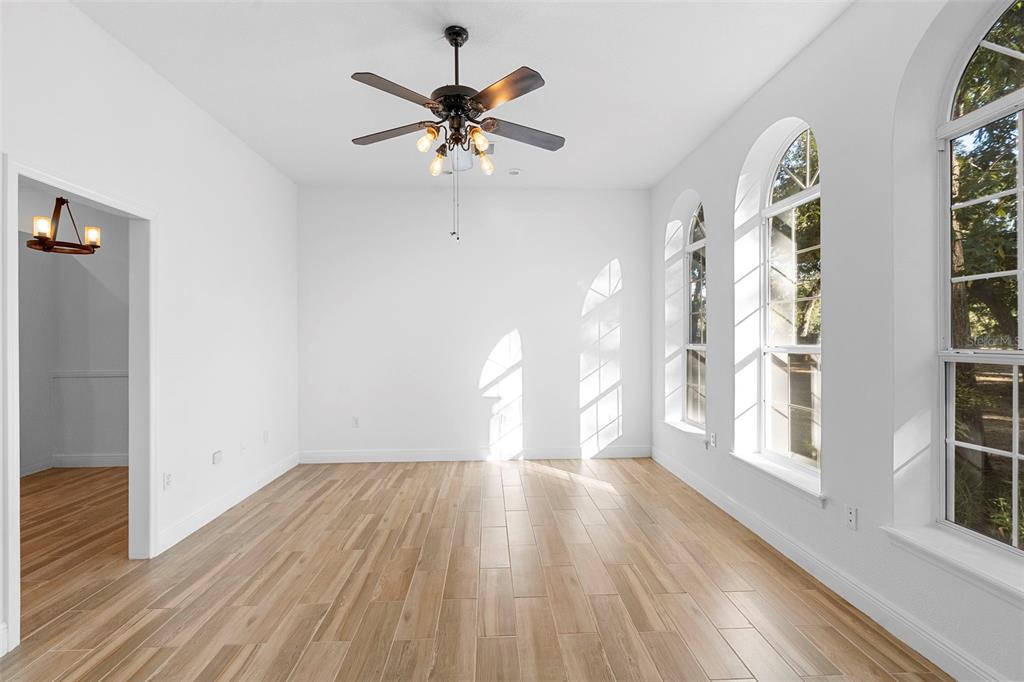 4855 Lillian Black Road St. Cloud, FL 34771 - Photo 17 of 62 a view of an entryway with wooden floor