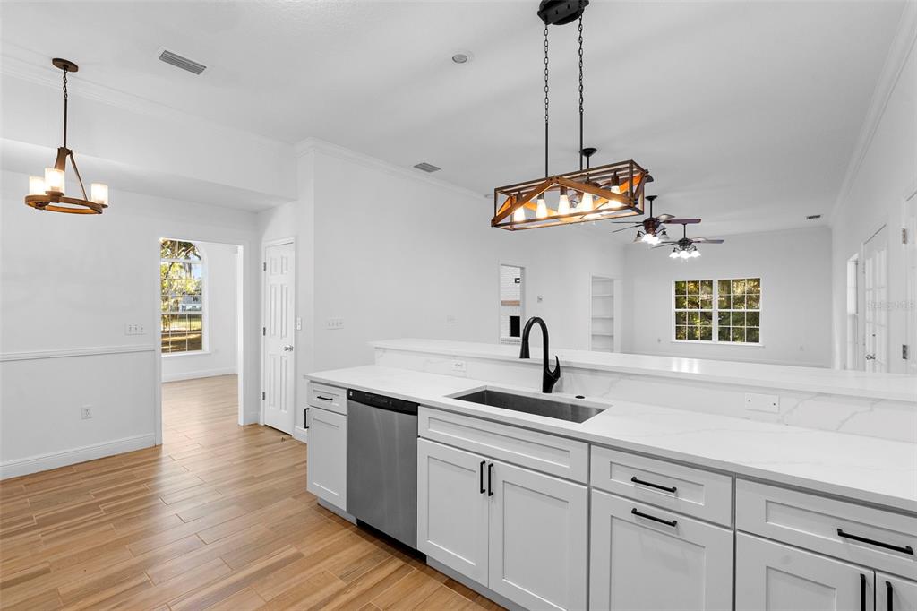4855 Lillian Black Road St. Cloud, FL 34771 - Photo 25 of 62 a kitchen with sink and window