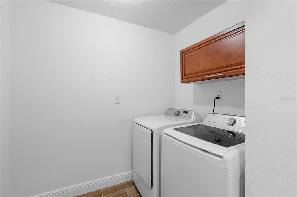 4855 Lillian Black Road St. Cloud, FL 34771 - Photo 27 of 62 a utility room with dryer and washer