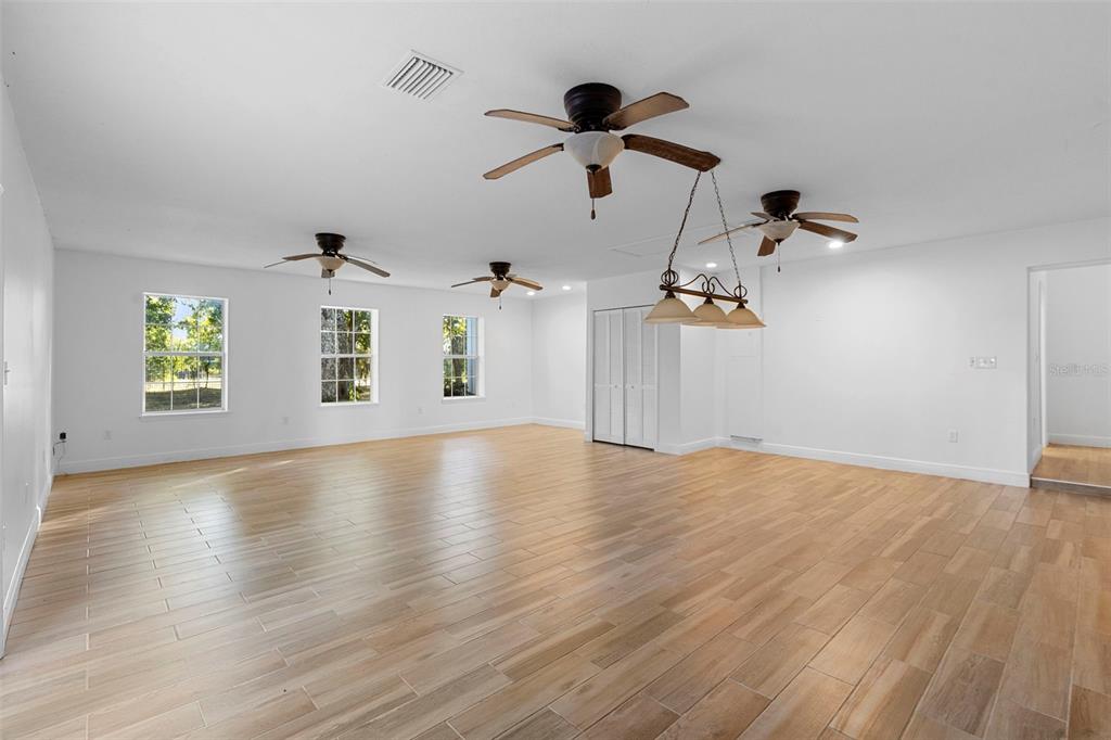 4855 Lillian Black Road St. Cloud, FL 34771 - Photo 28 of 62 an empty room with windows and ceiling fan