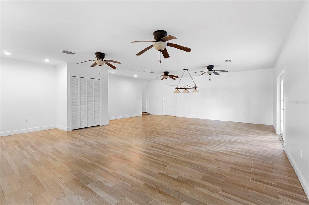 4855 Lillian Black Road St. Cloud, FL 34771 - Photo 29 of 62 a view of empty room with wooden floor