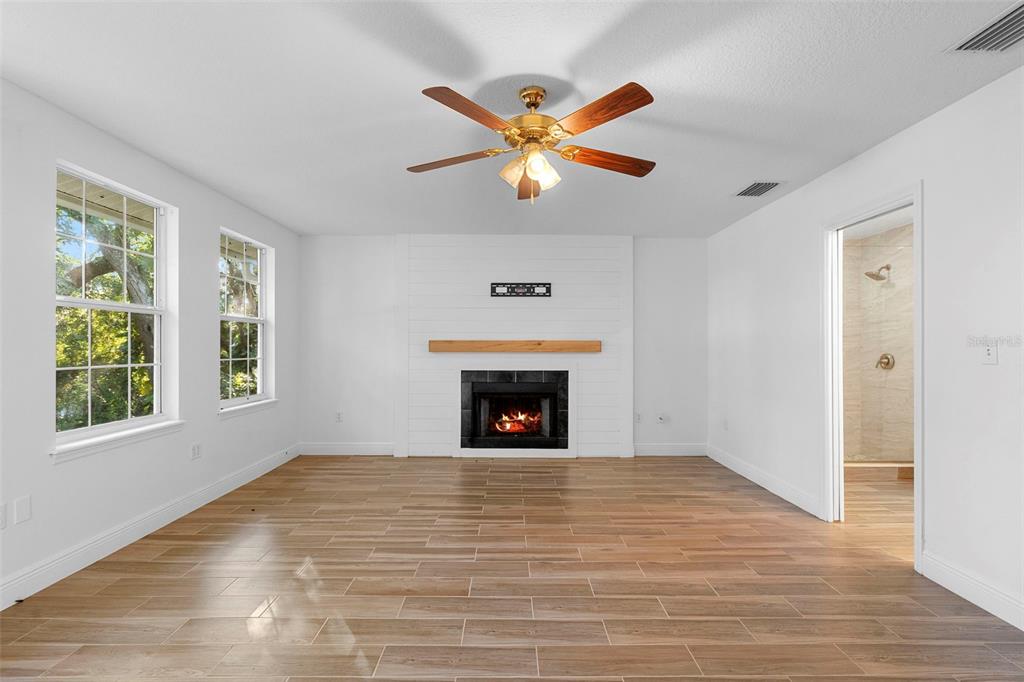 4855 Lillian Black Road St. Cloud, FL 34771 - Photo 39 of 62 a view of an empty room with window and fireplace