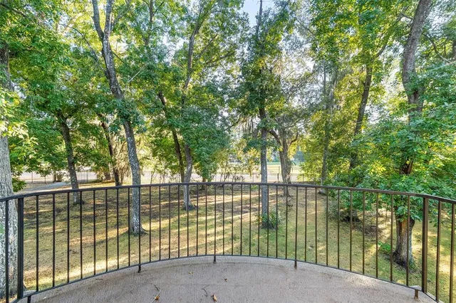 an empty room with a empty space and windows