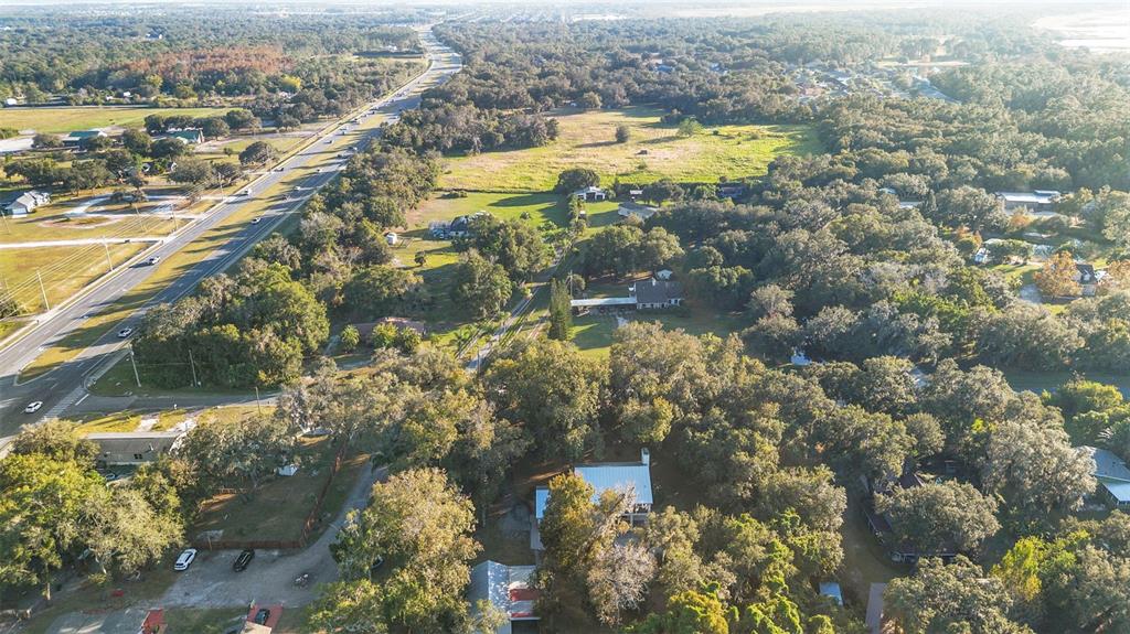 4855 Lillian Black Road St. Cloud, FL 34771 - Photo 59 of 62 an aerial view of residential houses with outdoor space
