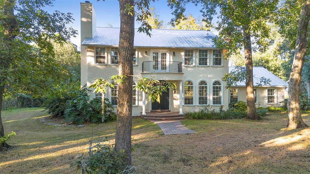 4855 Lillian Black Road St. Cloud, FL 34771 - Photo 6 of 62 a front view of a house with a yard