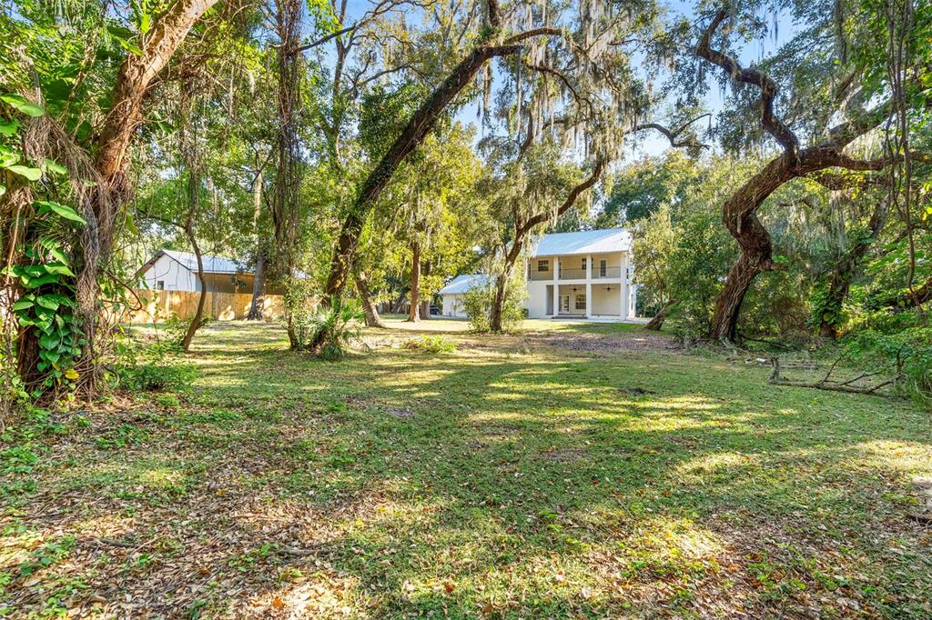 4855 Lillian Black Road St. Cloud, FL 34771 - Photo 7 of 62 a view of a house with a yard