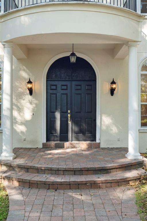 4855 Lillian Black Road St. Cloud, FL 34771 - Photo 9 of 62 a view of a entryway door of the house