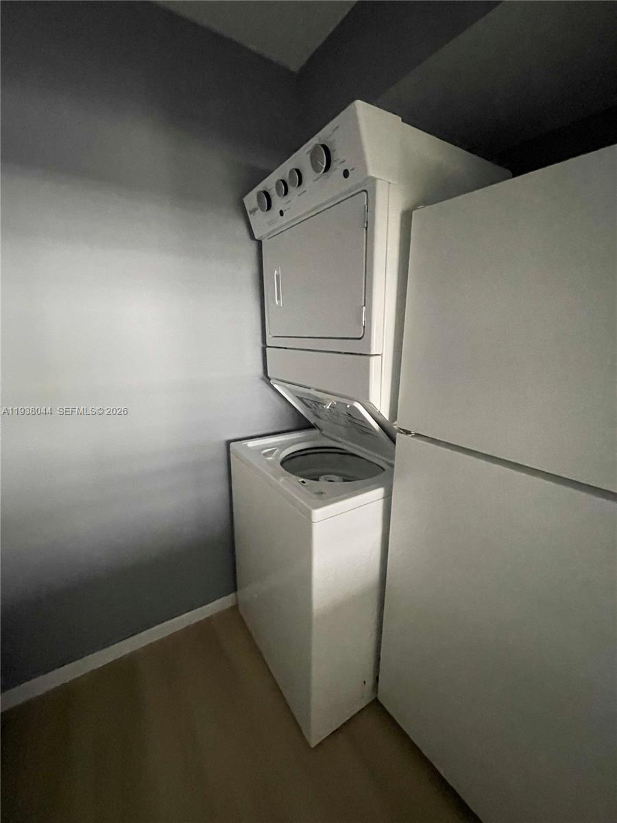 15330 Southwest 72nd Street, Unit 721 Miami, FL 33193 - Photo 14 of 15 a utility room with dryer and washer