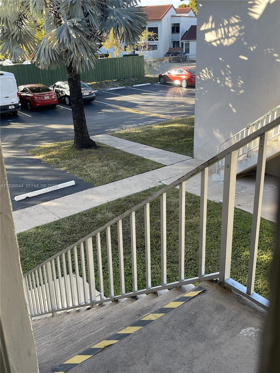 15330 Southwest 72nd Street, Unit 721 Miami, FL 33193 - Photo 3 of 14 a view of a porch