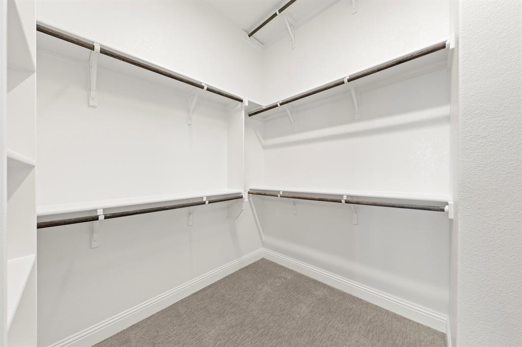 3306 Agnew Street Celina, TX 75009 - Photo 19 of 27 a view of an empty walk in closet