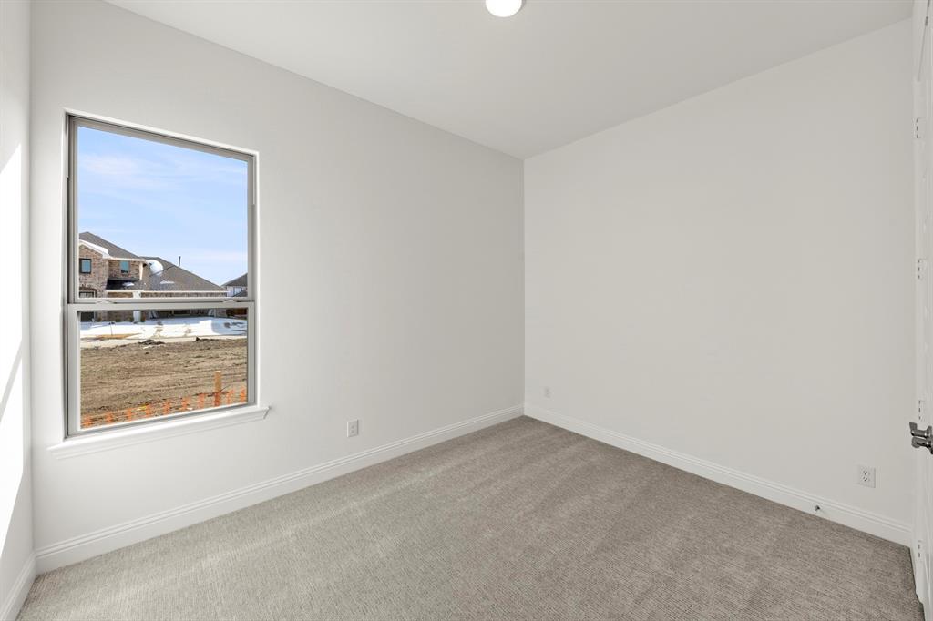 3306 Agnew Street Celina, TX 75009 - Photo 22 of 27 a view of an empty room and window