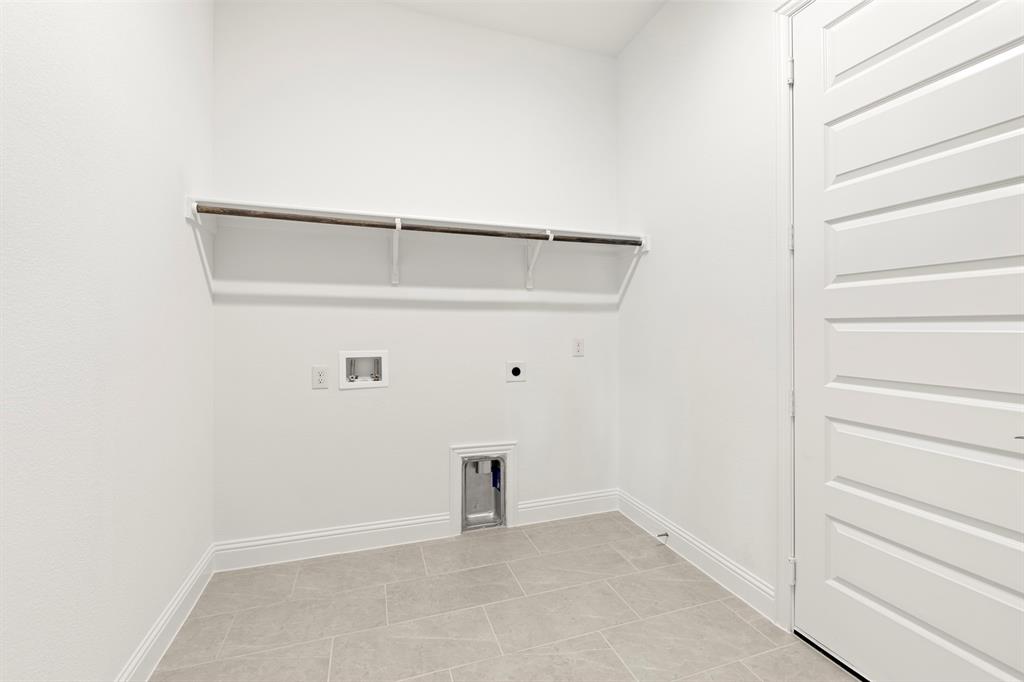 3306 Agnew Street Celina, TX 75009 - Photo 23 of 27 a view of an empty walk in closet