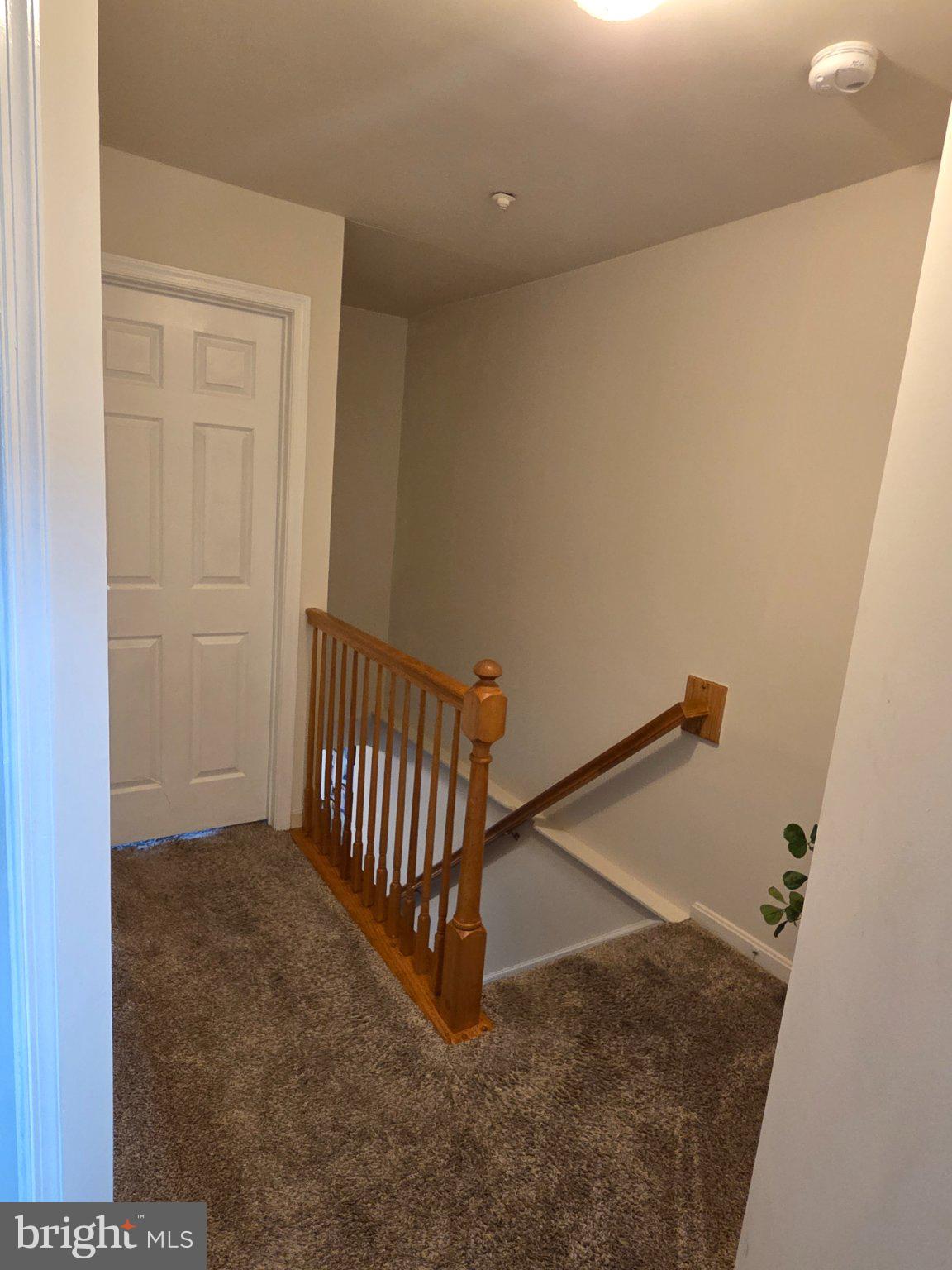 511 Primus Court Frederick, MD 21703 - Photo 21 of 40 Inviting staircase with warm tones.