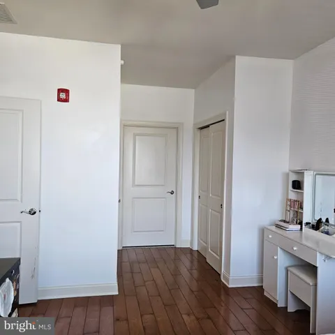 a bathroom with a sink vanity and mirror