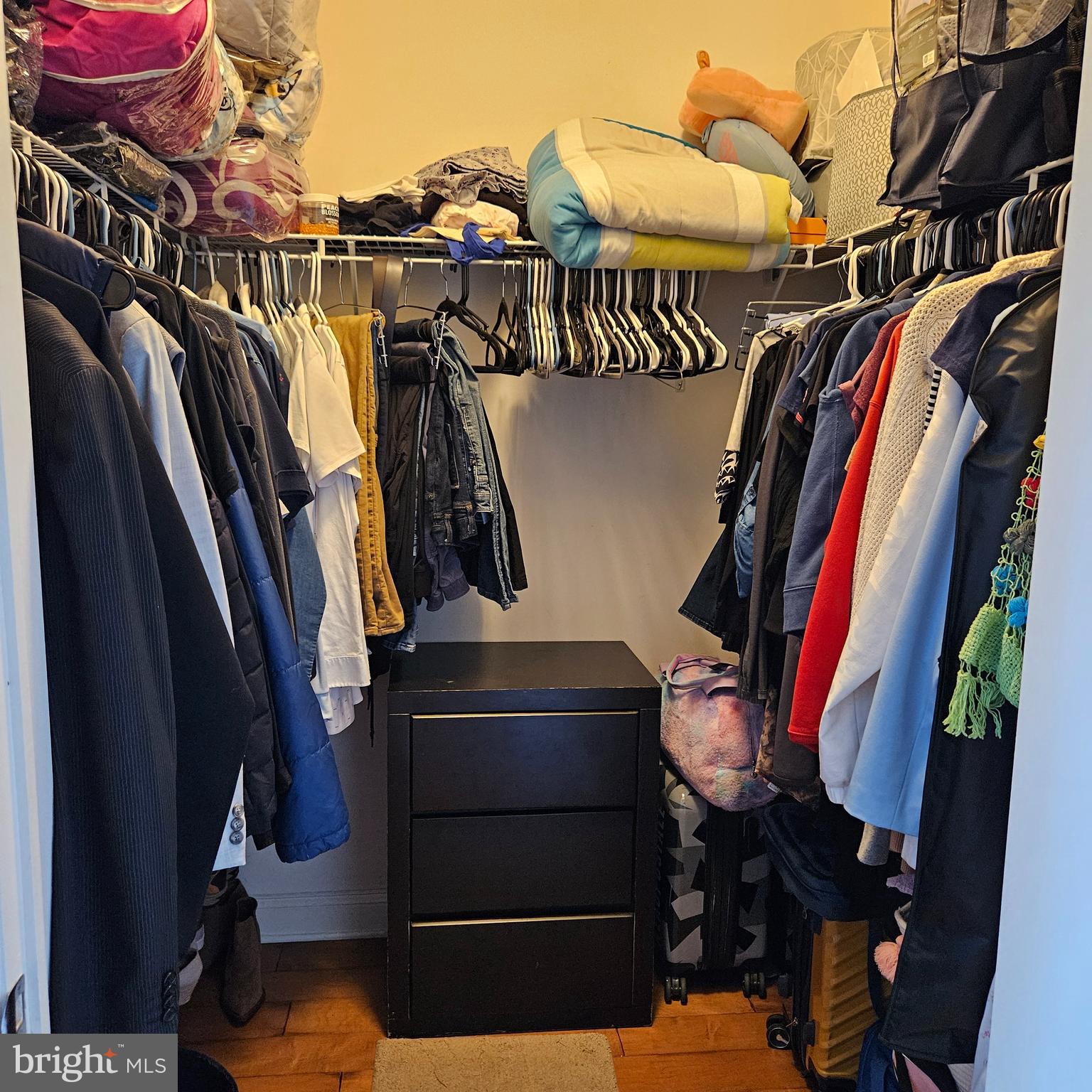 968 Robbinsville Edinburg Road, Unit 305 Robbinsville, NJ 08691 - Photo 21 of 24 a view of walk in closet with clothes and shoes