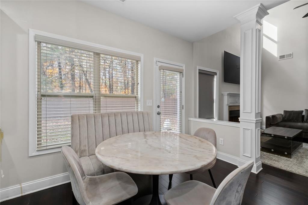 515 Lakeside View Fairburn, GA 30213 - Photo 21 of 43 a view of a dining room with furniture and wooden floor