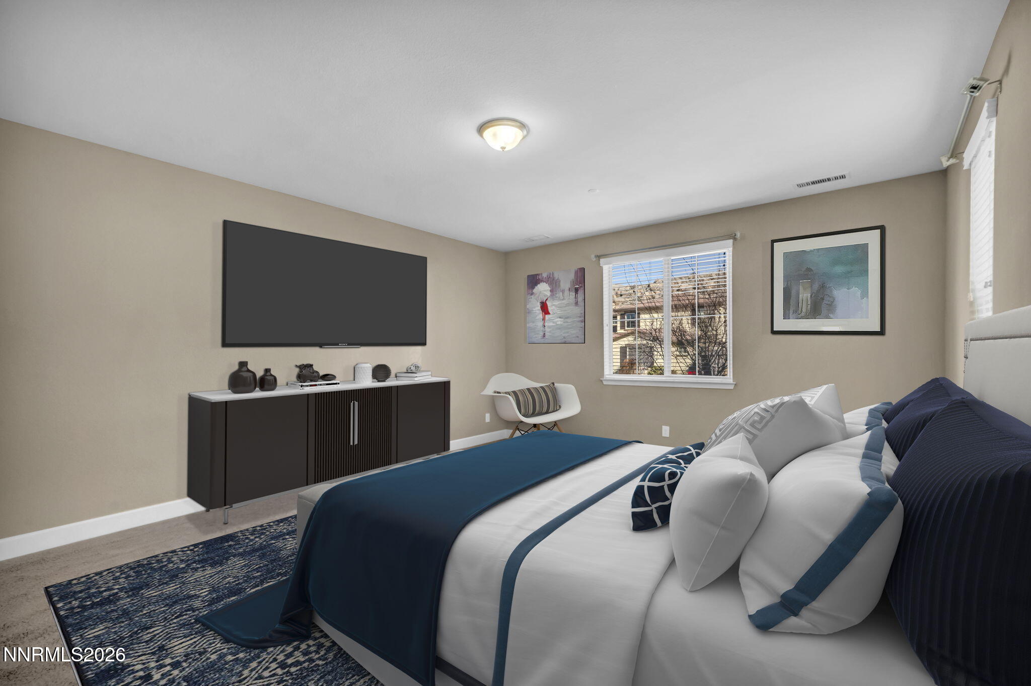 1725 Verdi Vista Court Reno, NV 89523 - Photo 11 of 19 a bedroom with a bed and a flat screen tv