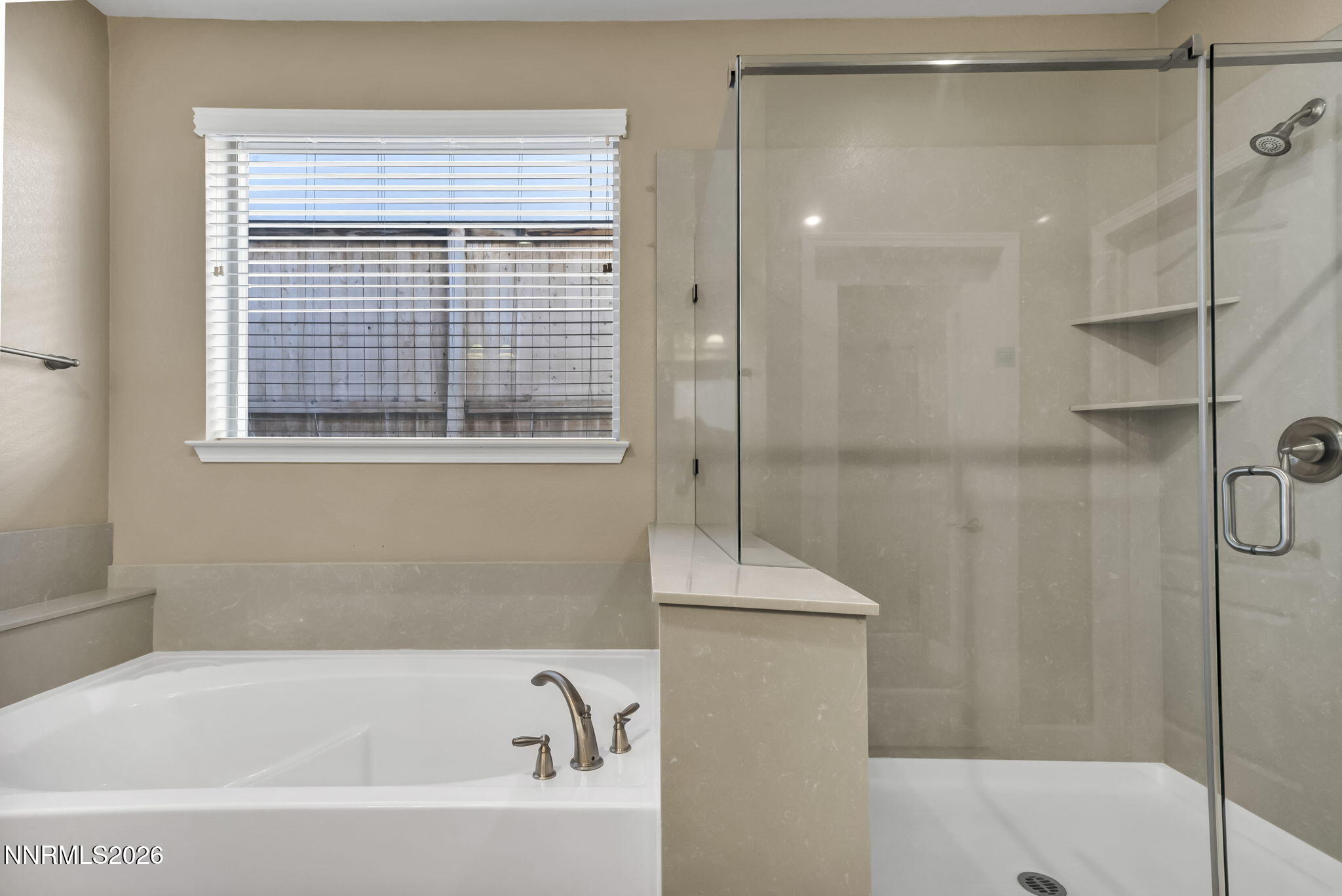 1725 Verdi Vista Court Reno, NV 89523 - Photo 13 of 19 a bathroom with a bathtub and shower